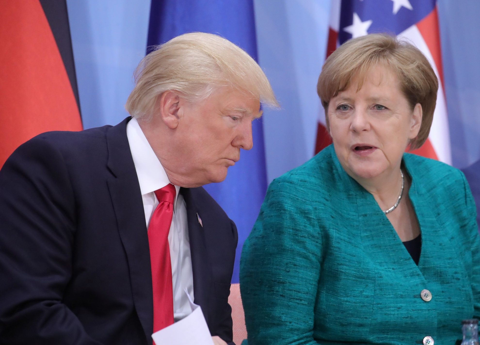 Trumpas-ir-Merkel-sutare-grieztinti-sankcijas-Siaures-Korejai