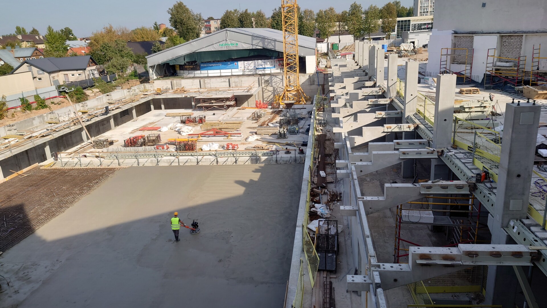 Bemaž prieš metus pradėtos olimpinius standartus atitiksiančio baseino statybos Panevėžyje vyksta numatytu ritmu, tačiau per 35 planuotus mėnesius jo baigti nepavyks.