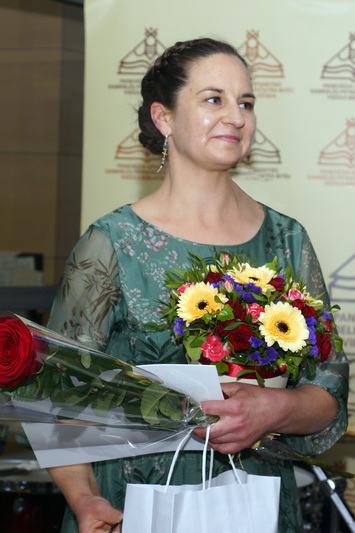 Panevėžio rajono Naujamiesčio gimnazijos bibliotekininkė Laura Šinkūnienė. 