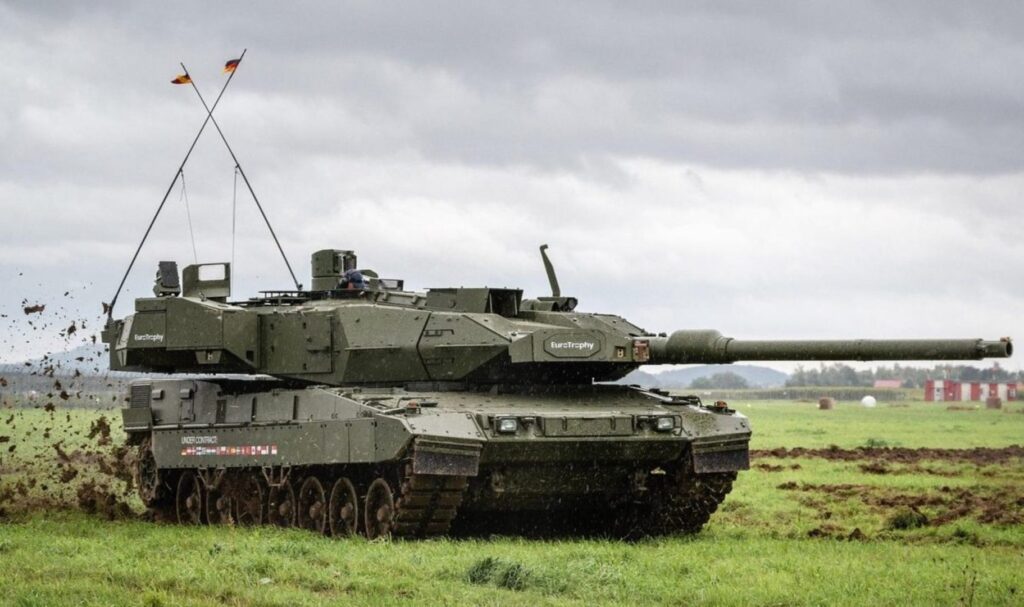 Krašto apsaugos ministerija (KAM) kartu su tarptautiniais partneriais – „KNDS Deutschland“, „Rheinmetall Landsysteme“ ir valstybės valdomos energetikos grupės „EPSO-G“ atstovais pasirašė memorandumą dėl pramoninio bendradarbiavimo, susijusio su pagrindinių kovos tankų „Leopard 2 A8“ surinkimo bei priežiūros infrastruktūros kūrimu Lietuvoje, skelbia KAM.